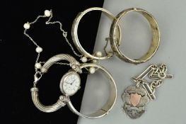 A SELECTION OF MAINLY SILVER AND WHITE METAL JEWELLERY to include three hinged bangles, a bracelet