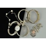 A SELECTION OF MAINLY SILVER AND WHITE METAL JEWELLERY to include three hinged bangles, a bracelet