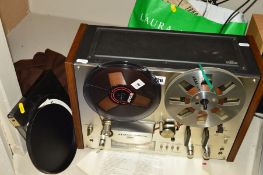 AN AKAI GX4000 DB REEL TO REEL TAPE RECORDER, with a bag of tapes, runs and plays but slow to