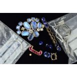 A MISCELLANEOUS COLLECTION OF JEWELLERY ITEMS to include an oval mixed cut blue sapphire weighing