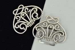 A LATE VICTORIAN SILVER BUCKLE, the two part buckle of openwork scrolling design, with silver