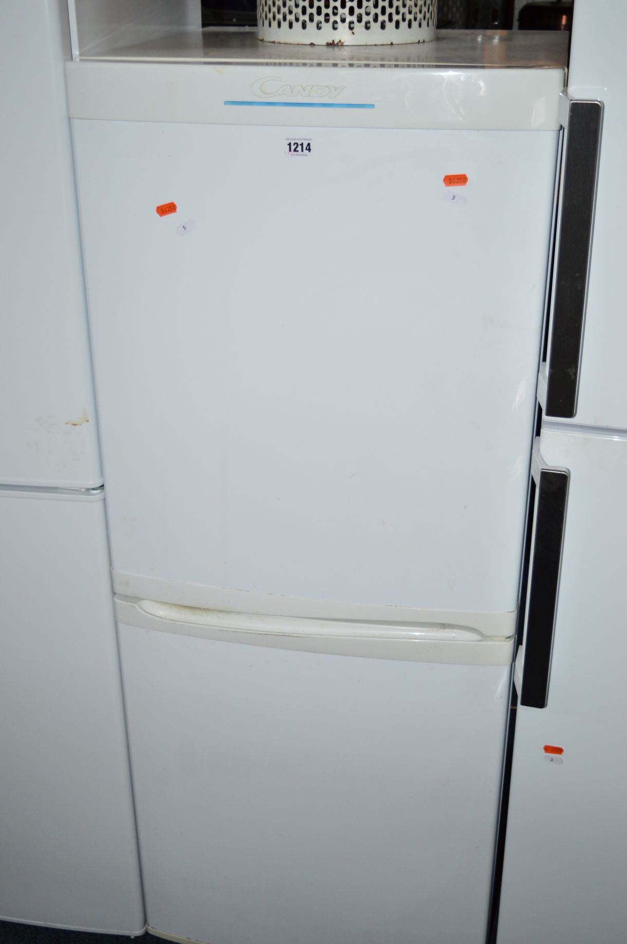 A CANDY FRIDGE FREEZER (height 136cm) (fridge 5 degrees/freezer -23 degrees)