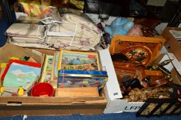 FOUR BOXES OF SUNDRIES, to include bedspread, pillow shams, linen, jigsaws, toys, wooden items, cork