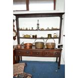 A GEORGIAN OAK COTTAGE DRESSER, the top with double plate rack above a base with three various