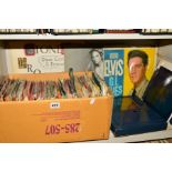 A BOX OF OVER ONE HUNDRED SINGLES, a few L.P's and a Queen II CD box, the singles are mostly 1950'