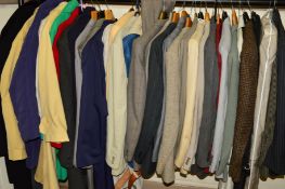 A QUANTITY OF GENTLEMANS CLOTHING to include suits by Dax, coats by Dannimac, shirts, a pair of high