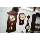 AN EARLY 20TH CENTURY OAK WALL CLOCK, an oak barometer marked E Roberts, Rochdale and two other