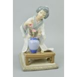 A LLADRO FIGURE, 'Geisha Girl arranging flowers' No4840, height 19cm (flower and stem missing)