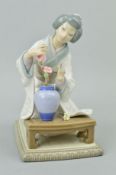 A LLADRO FIGURE, 'Geisha Girl arranging flowers' No4840, height 19cm (flower and stem missing)
