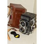 A ROLLEIFLEX 3.5F TWIN LENS RELEX CAMERA IN ORIGINAL LEATHER CASE, fitted with a Heidosmat 75mm f2.8