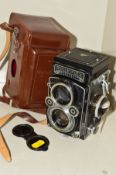 A ROLLEIFLEX 3.5F TWIN LENS RELEX CAMERA IN ORIGINAL LEATHER CASE, fitted with a Heidosmat 75mm f2.8