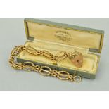 A 9CT GOLD BRACELET of a gate bracelet style design to the heart padlock clasp, with safety chain,