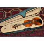 AN UNMARKED VIOLIN, with 33cm single piece back, ebonised tail piece, fingerboard and tuning pegs,
