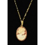 A CAMEO PENDANT AND CHAIN, the oval cameo depicting a lady in profile within a plain mount to the