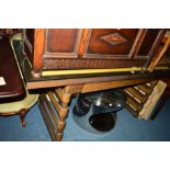 A DESIGNER OAK DESK, the top with yellow leather inlay, single drawer on a laddered base