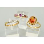 THREE GEM RINGS, the first a three stone, illusion set diamond ring, the central single cut