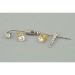 A STICKPIN, A PENDANT AND A PAIR OF EAR STUDS, the stickpin claw set with a colourless zircon,