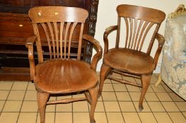 A PAIR OF EARLY 1920'S/30'S OAK OFFICE ARMCHAIRS