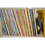 A BOX OF OVER NINTY L.P'S AND TWENTY SINGLES AND E.P'S, from artists including The Beatles, The