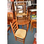 A PINE KITCHEN TABLE and three rush seated chairs (4)