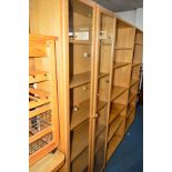 A MODERN BEECH GLAZED TWO DOOR BOOKCASE, width 80cm x depth 31cm x height 203cm