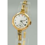 AN EARLY 20TH CENTURY 9CT GOLD LADY'S WRISTWATCH, white enamel dial with Roman numerals and