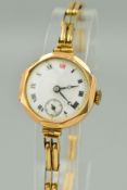 AN EARLY 20TH CENTURY 9CT GOLD LADY'S WRISTWATCH, white enamel dial with Roman numerals and