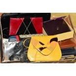 A BOX OF MAINLY VINTAGE HANDBAGS, etc, to include purple patent bag, a grey snakeskin clutch, a