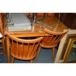 A MODERN DINING TABLE and four beech stick back chairs (5)
