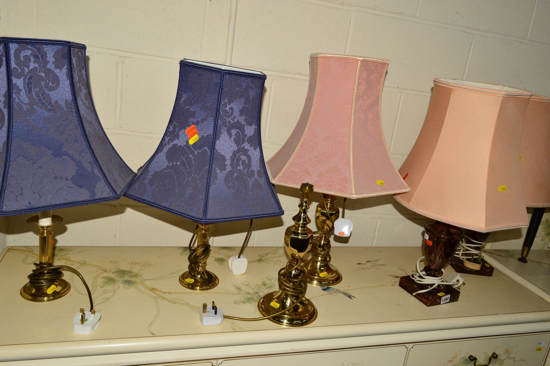 A PAIR OF MARBLE TABLE LAMPS and four brass table lamps, all with shades (6)