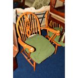 TWO ERCOL BEECH FRAMED STICK BACK CHAIRS (sd)