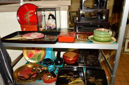 A QUANTITY OF ORIENTAL LACQUERED ITEMS ETC, to include trays, boxes, oriental figure in a display