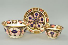 A ROYAL CROWN DERBY IMARI CUP AND SAUCER AND A SUGAR BOWL, '1128' pattern (3)