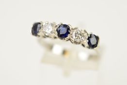 A MID TO LATE 20TH CENTURY SAPPHIRE AND DIAMOND HALF HOOP FIVE STONE RING, estimated modern round
