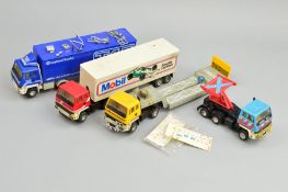 A QUANTITY OF UNBOXED SCALEXTRIC LEYLAND T45 ROADTRAIN RACING TRUCK MODELS, two articulated box vans