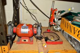 A SEALEY 6'' BENCH GRINDER, a table top pillar drill stand and a pair of small pine stair rails (4)