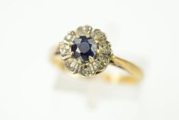 A LATE 20TH CENTURY SAPPHIRE AND DIAMOND ROUND CLUSTER RING, ring size P, hallmarked 9ct gold,