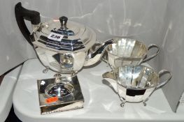 AN EPNS THREE PIECE TEA SET, together with a silver plated rectangular ashtray (4)