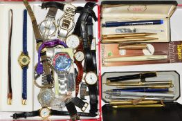 A SELECTION OF WATCHES AND PENS IN TWO BOXES to include stainless steel and leather strap