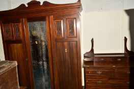 AN EDWARDIAN MAHOGANY TWO PIECE BEDROOM SUITE, comprising of single mirror door wardrobe, width
