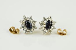 A MODERN PAIR OF 9CT GOLD SAPPHIRE AND CUBIC ZIRCONIA OVAL STUD EARRINGS, hallmarked 9ct gold,