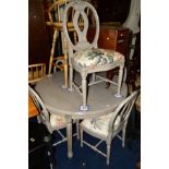 A GREY PAINTED CIRCULAR EXTENDING DINING TABLE on fluted legs, diameter 120cm x height 76cm,