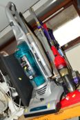 A DYSON DC03 UPRIGHT VACUUM, an Electrolux upright vacuum and a small Royale upright vacuum (3)