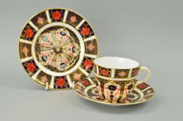 A ROYAL CROWN DERBY IMARI TRIO, '1128' pattern, to include cup, saucer and side plate (3)