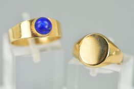 TWO RINGS, the first a signet ring, 9ct hallmark for Birmingham, ring size K1/2, the second designed