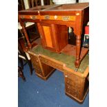 A VICTORIAN WALNUT KNEE HOLE DESK with a green tooled leather top, flanked by dummy drawer