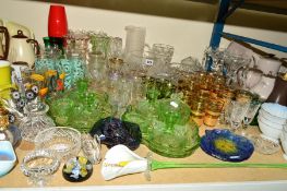 A LARGE GROUP OF GLASSWARES, to include some cut glass, blue vaseline jug, pair lustres etc