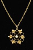 AN EARLY 20TH CENTURY PEARL PENDANT, open foliate design, together with a belcher link chain