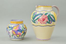 CARTER STABLER ADAMS POOLE POTTERY VASE AND JUG, both florally decorated, height of vase 11.5cm