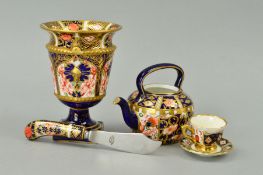 A SMALL GROUP OF ROYAL CROWN DERBY AND STAFFORDSHIRE MINIATURES, to include '1128' pattern urn,